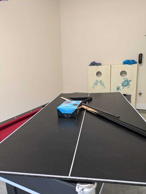 Ping Pong table and cornhole games