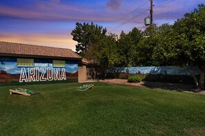 Cornhole in front of the Arizona mural!