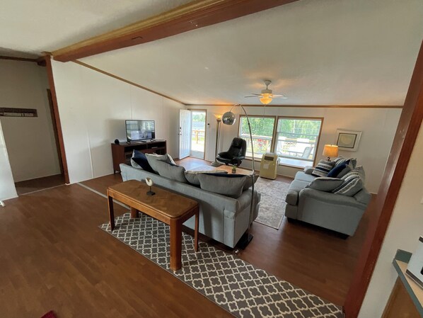 Living Room and a peek at the large deck out front