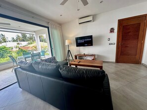 Sleeper sofa (platform bed) with 45' Smart TV.