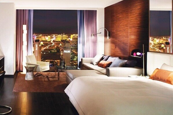 Strip View Balcony Studio Suite - Living room with queen size sofa bed may accommodate additional 2 guests.
