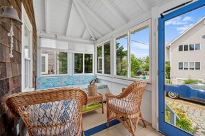 Seating area on the screened porch - 17 Captain Dunbar Road Brewster Cape Cod-Prestons Haven-NEVR