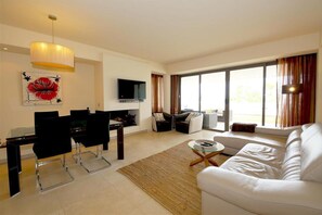 Another picture of the spacious lounge with dining area