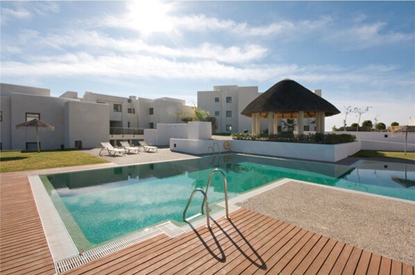 Inviting communal swimming pool available in this complex