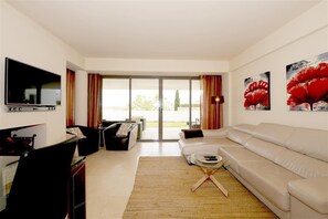 Bright and spacious lounge area with access to the terrace