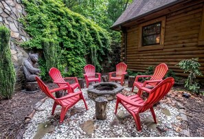 Outdoor seating area with a firepit.