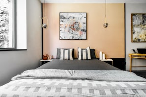 Work and Rest: Balance work and relaxation with a dedicated workspace and a luxurious memory foam bed.