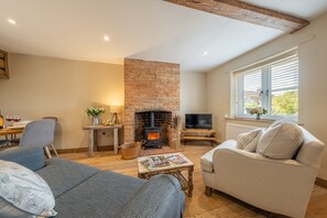 Willow Cottage, South Creake: Sitting room with view of the village green