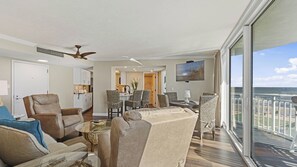 View across the living room wit private balcony.
