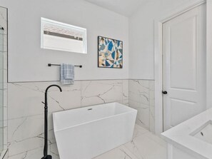 Master bathroom with soakers tub.