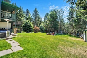 Private patio and a backyard fire pit surrounded by mature trees. Please note that thPrivate patio and a backyard fire pit surrounded by mature trees. Please note that the patio area is private, but the backyard/fire pit is a shared space with the upstair