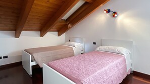 Beautiful bedroom with single beds ideal for families