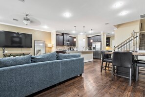 The expansive open concept offers a perfect space for family time. 