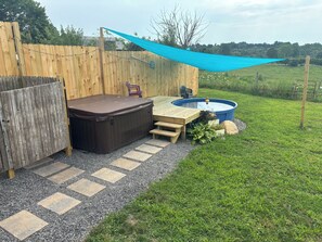 Our outdoor shower, hot tub and stock tank pool.