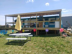 Full covered deck with outdoor kitchen.