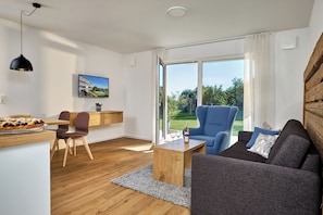 Landsuite Pfänder, 53qm, 1 Schlafzimmer, max. 3 Personen-Wohn- und Esszimmer mit Gartenzugang