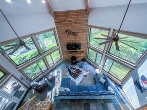 View from the top of the spiral staircase looking down into the living room