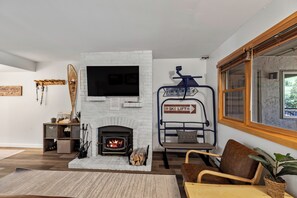 Cozy fireplace and large flat screen TV