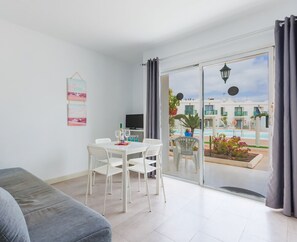 View (from property/room),Living room,Floor plan,Pool view