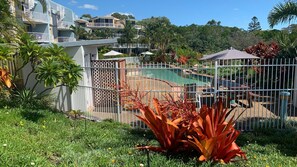  Surrounded by lush landscaping and featuring crystal-clear waters, this pool provides a tranquil and picturesque setting for relaxation.