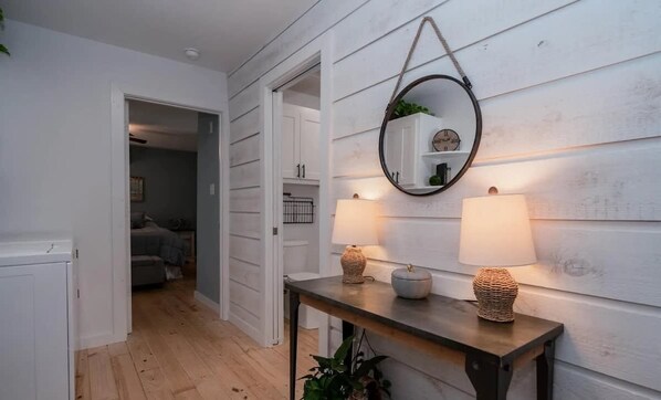 Such a cute little entry way! Washer and dryer are also located here.