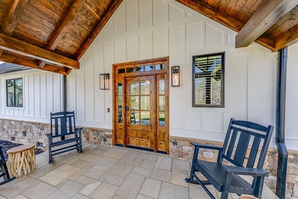 Relaxing front porch with rocking chairs