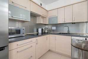 Independent kitchen with a kettle.
