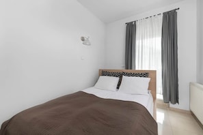 Bedroom with comfortable bed.