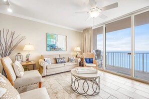 Living room with sleeper sofa and balcony access
