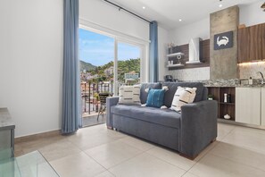 Comfortable sofa in the living room with a panoramic view