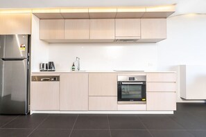 Purely clean, organised, and fully equipped kitchen where you can prepare your mouthwatering food to serve to your friends and family. You can also use the kitchen utensils and appliances available.
