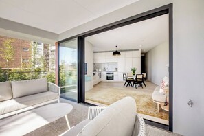 With vistas over the neighbourhood, the large balcony is an idyllic spot to soak up the fresh air.

