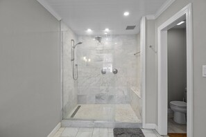 Recently renovated large walk-in shower with a modern design