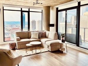 Corner unit with west facing view of the mountains and downtown