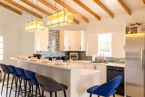 Stylish bar area with seating for six