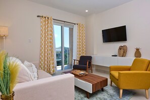 Relax in our inviting living area with sofa bed, complete with a smart TV for your entertainment