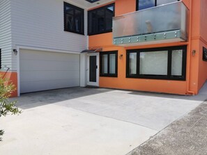 Garage with laundry and parking area