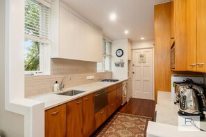 Well-equipped galley style kitchen