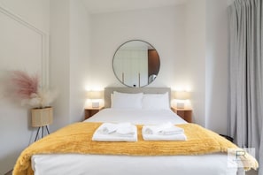 Bedroom 1 - Queen bed with wardrobe and dressing table