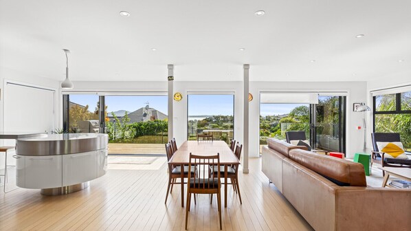 Fully equipped kitchen, dining area, and living room