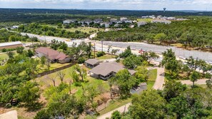 Enjoy the huge fenced backyard that offers plenty of room and mature shade trees