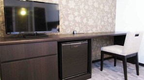All rooms feature a custom-made desk and TV
