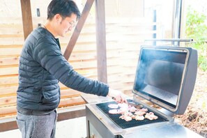 Outside, enjoy a wood-fired barbecue.