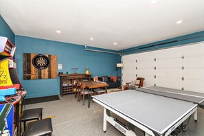 Game room with Arcade, Ping Pong, Darts, board games and more!