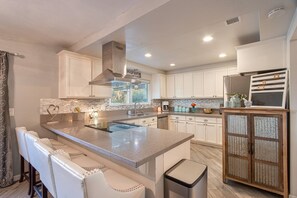 Beautiful counter height bar stools to sip wine while chilling at Dovetale Vineyard Villa