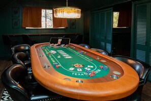 Our poker table is set—bring your best game and enjoy the ambiance