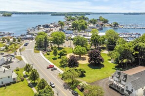 Experience the best of Sodus Point from this vantage point, showcasing the scenic waterfront and charming local attractions. The tranquil setting is perfect for leisurely strolls and exploring the unique shops and eateries. Immerse yourself in the na