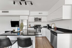 Unleash your culinary creativity in our fully-equipped kitchen. 