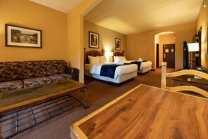 "Entire room with a cozy seating area and TV."