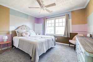 second room with a queen bed